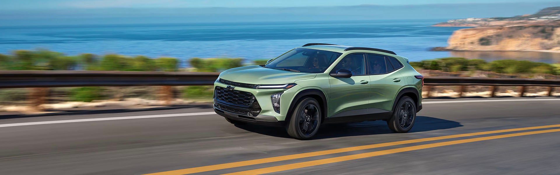 a chevy trax driving down the highway