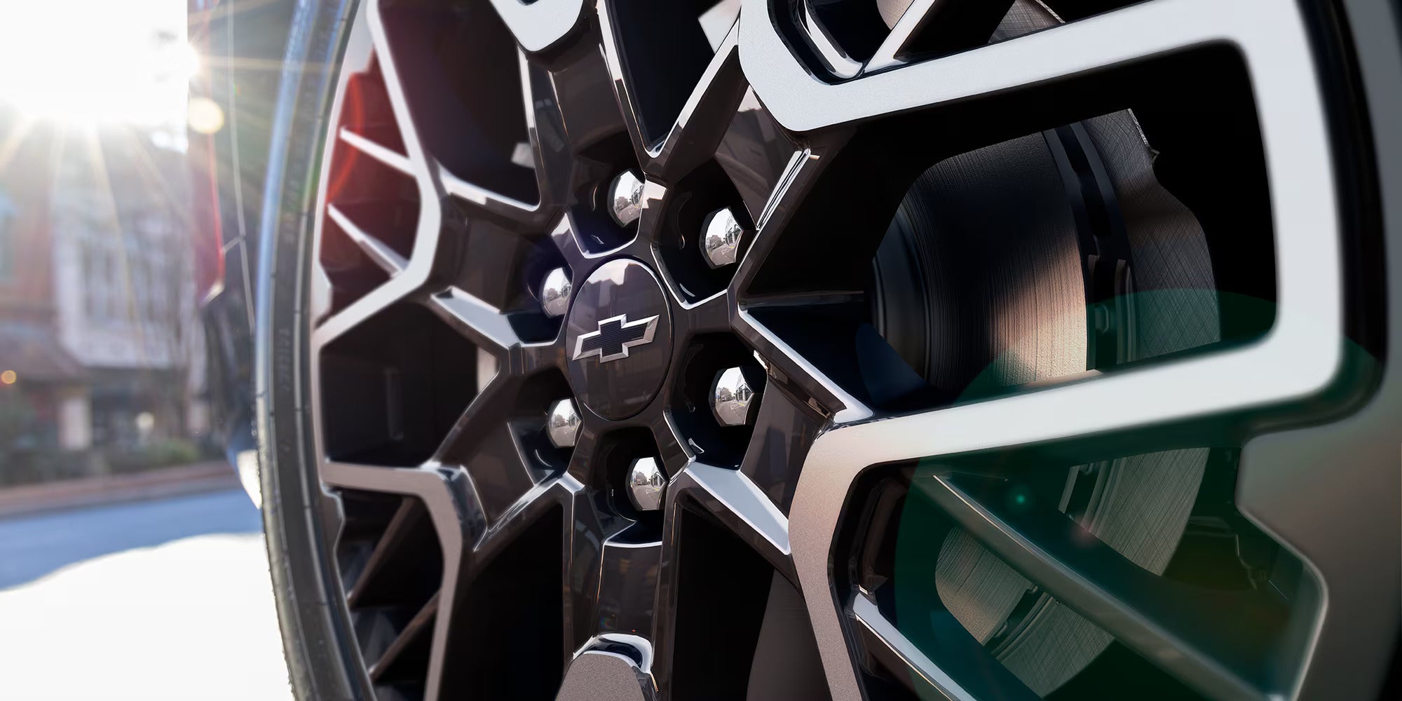 up close of the wheel and lug pattern on a 2025 chevy blazer