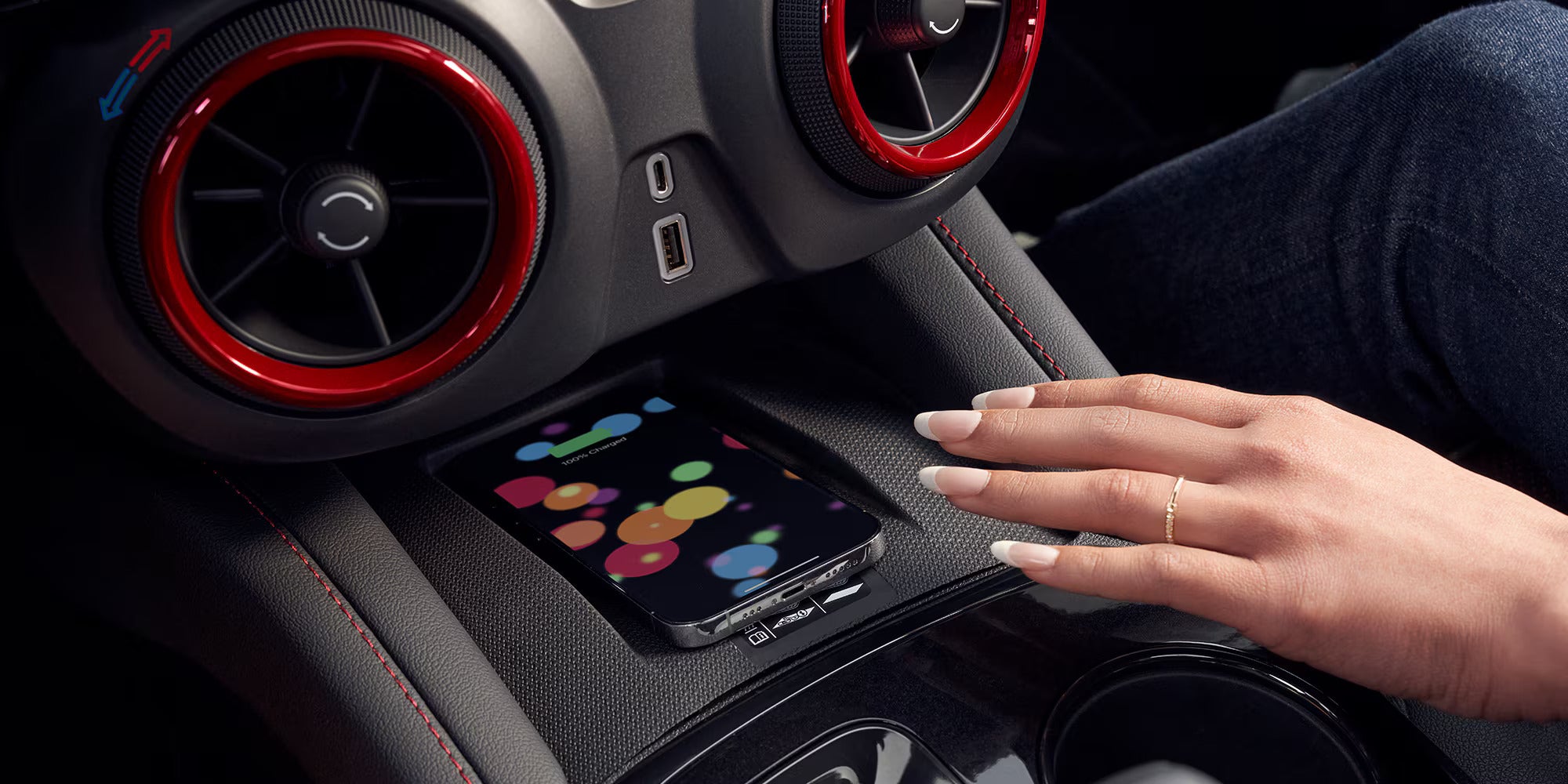 wireless phone charging being displayed in the 2025 chevy blazer