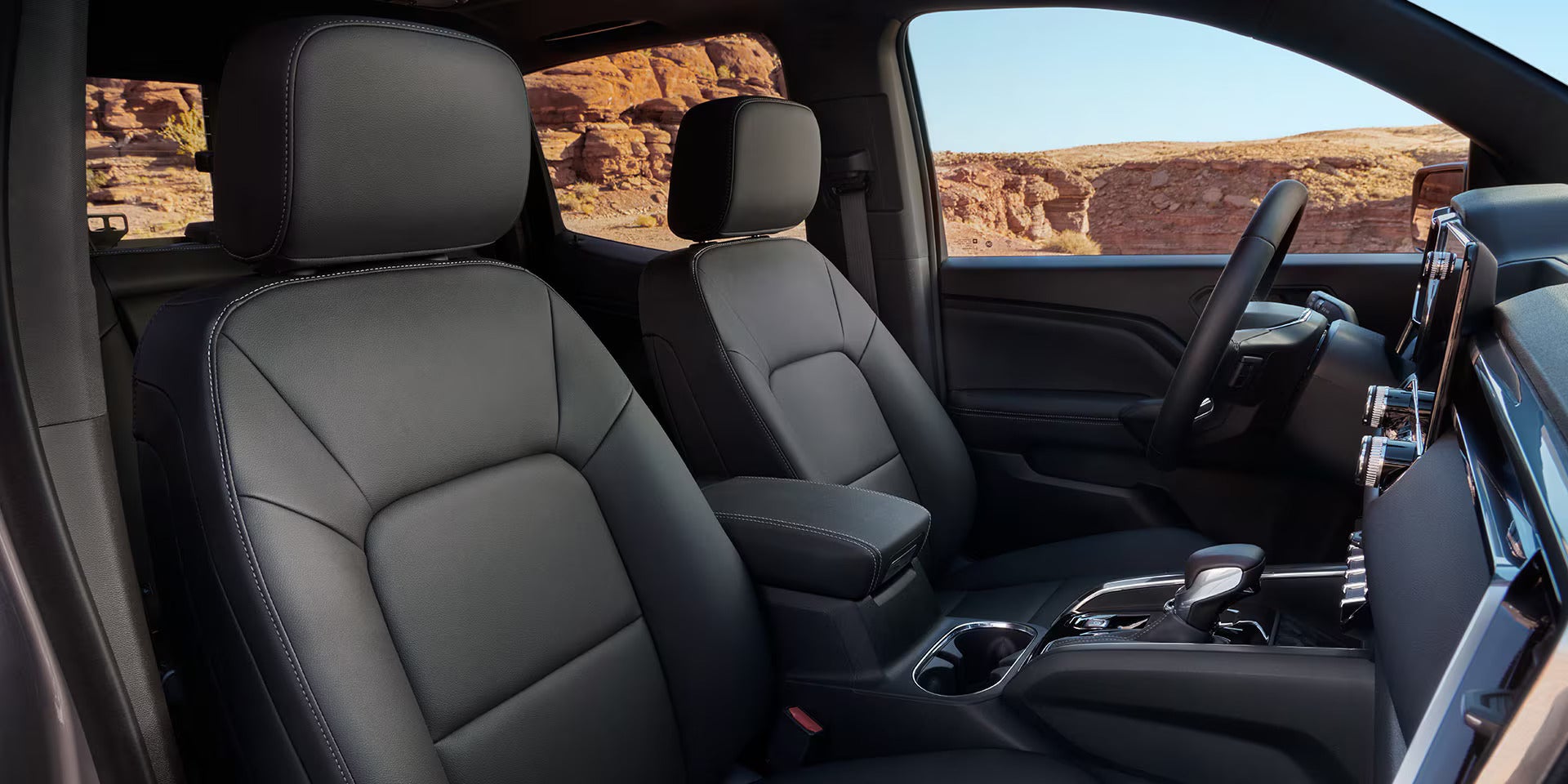 side profile of the front interior seating in a 2025 gmc canyon