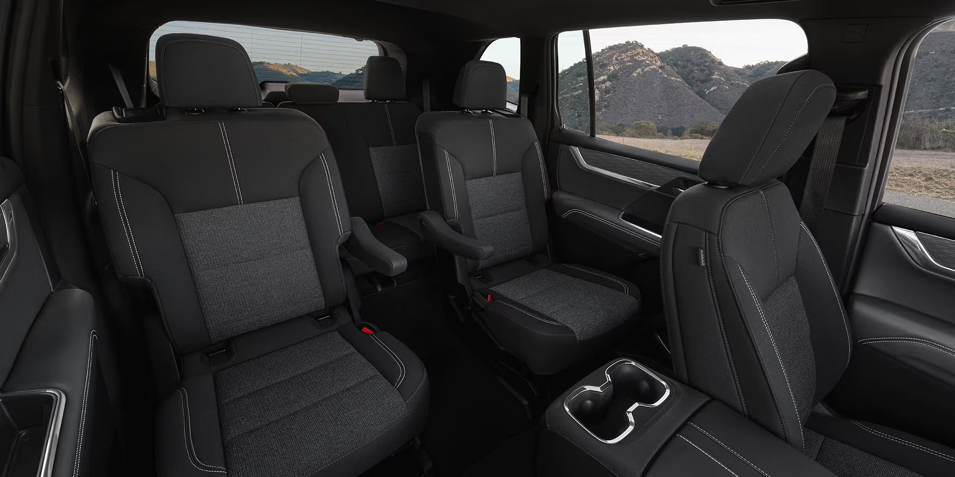 front interior looking back at the 2nd row and 3rd row in a 2026 acadia