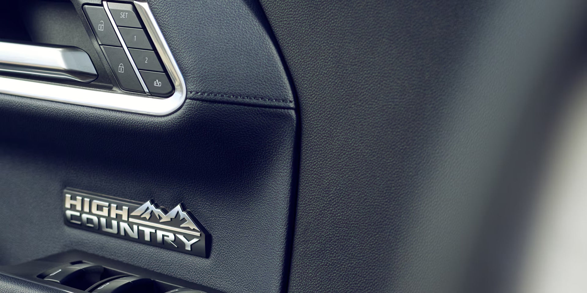 High Country badging on the interior door panel of a silverado 1500